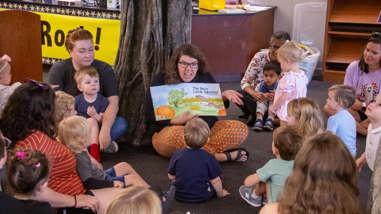 ms-jessica-reading-at-flpl Ms. Jessica reading to kids at Florence-Lauderdale Public Library